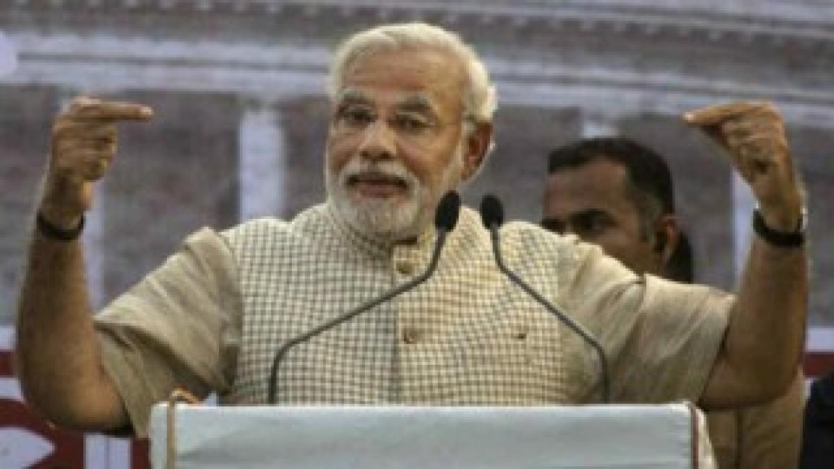 Fight is against poverty, not Gogoi, says Modi 